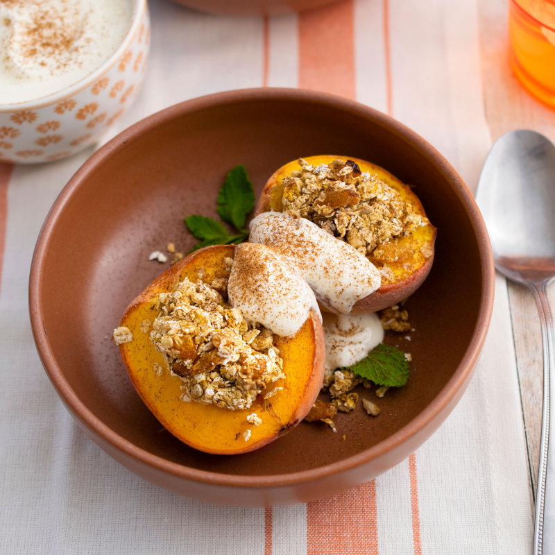 Baked peaches with an oaty topping